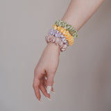 Ein Hauch von Luxus für Ihre Frisur: Das Beryl Scrunchie von Claide aus echter Seide